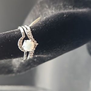 E-9 3 piece ring set silvertone with cloudy blue stone with clear accents